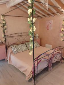 Posteľ alebo postele v izbe v ubytovaní Splendido rustico shabby
