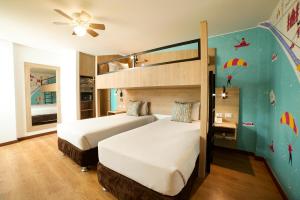 Двухъярусная кровать или двухъярусные кровати в номере Centro by Casa Andina