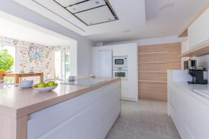 A kitchen or kitchenette at Fidalsa Majestic