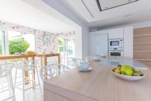 A kitchen or kitchenette at Fidalsa Majestic