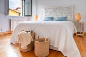 A bed or beds in a room at Fidalsa Majestic