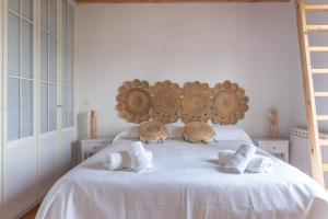 A bed or beds in a room at Fidalsa Majestic