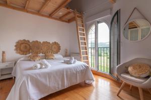 A bed or beds in a room at Fidalsa Majestic