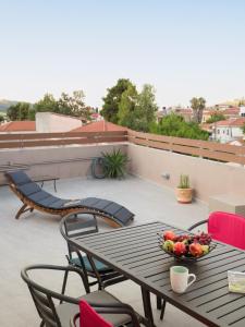 A balcony or terrace at The H Experience - The Good Life Archanes - Free parking