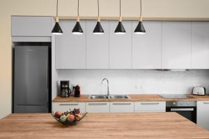 A kitchen or kitchenette at The H Experience - The Good Life Archanes - Free parking
