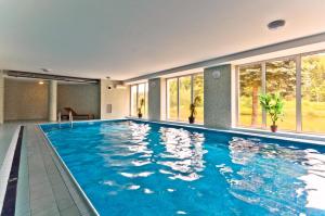 Bazén v ubytování Hotel Resort Luna nebo v jeho okolí