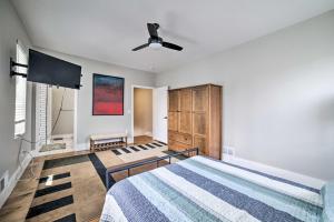 a bedroom with a bed and a ceiling fan at Well-Appointed Pittsburgh Home 1 Mi to Dtwn! in Pittsburgh