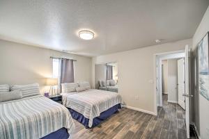 a hotel room with two beds and a window at Welcoming Carlsbad Home Near Parks and Town! in Carlsbad