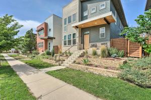 a house with a garden in front of it at Spacious Old Town North Home with Rooftop Deck! in Fort Collins