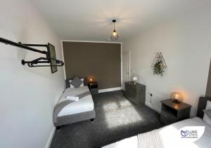 Katil atau katil-katil dalam bilik di Luke Stays - Pembroke Avenue