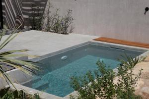 Bazén v ubytovaní Pure Villas alebo v jeho blízkosti