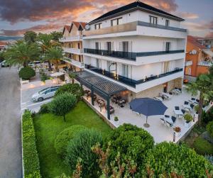 an aerial view of a building with an umbrella at B&B Sidro in Vodice