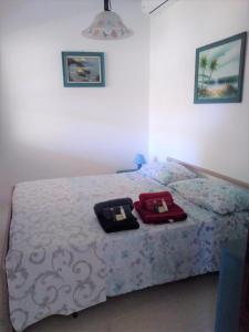 Krevet ili kreveti u jedinici u objektu Pinus Village Casa margherita a Pula-Chia - a 350 m reali dal mare