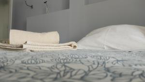 Cama o camas de una habitación en Alojamento Local Verde e Mar
