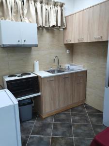 A kitchen or kitchenette at Houses in the Village
