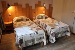 Postel nebo postele na pokoji v ubytování Gîte Châtel