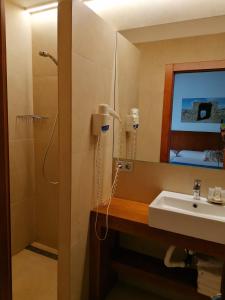 Koupelna v ubytování HOTEL ISLA PLANA