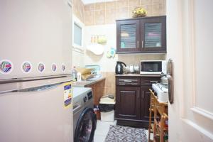 Kuchyň nebo kuchyňský kout v ubytování Sweet 3-bed apartment in a resort at North Coast + 2 fotografie