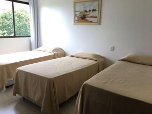 Postel nebo postele na pokoji v ubytování Flat térreo com duas suítes (até 8 pessoas) no Canarius Resort em Gravatá