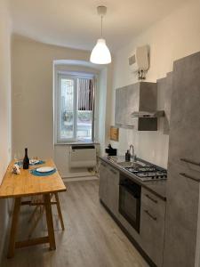 Kuchyňa alebo kuchynka v ubytovaní Belli 4 Apartment - Sauna -
