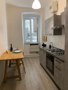 Kuchyňa alebo kuchynka v ubytovaní Belli 4 Apartment - Sauna -