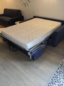 Łóżko lub łóżka w pokoju w obiekcie Maison avec piscine, jacuzzi et sauna privatifs - Mas de Nebbas