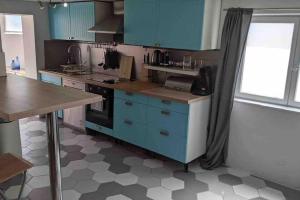 Kuchnia lub aneks kuchenny w obiekcie Maison avec piscine, jacuzzi et sauna privatifs - Mas de Nebbas