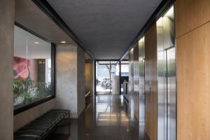 a hallway with a bench in a building at Quartier Dorrego in Buenos Aires