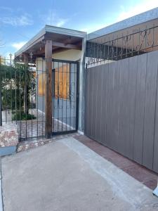 an entry gate to a house with a fence at CASA NUEVA in San Rafael