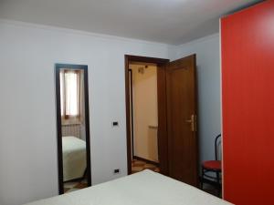 Una cama o camas en una habitación de Appartamento al Ghetto Vecchio