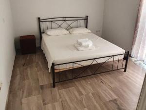 Posteľ alebo postele v izbe v ubytovaní Glyfada-Elliniko