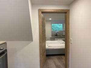 Postel nebo postele na pokoji v ubytování Haus am Iberg 4