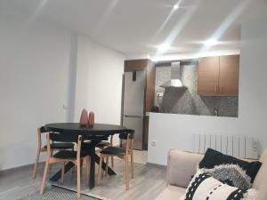 Posezení v ubytování Apartament Cèntric a Ribes de Freser Vall de Núria + 8 fotografií