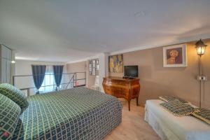 Llit o llits en una habitació de San secondo street