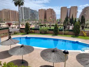 The swimming pool at or close to ACV- Costa Marfil II-2ª linea planta 6 frontal