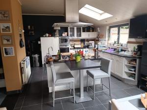 Eldhús eða eldhúskrókur á L 'Anima BB & table d'hôte