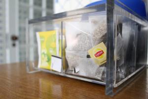 a plastic container filled with food on top of a table at Aveiro House - City Center Rooms in Aveiro