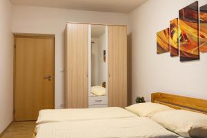 Letto o letti in una camera di Lipno 35 - Lipno In