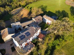 an aerial view of a house with solar panels on it at B & B Casolara in San Giovanni