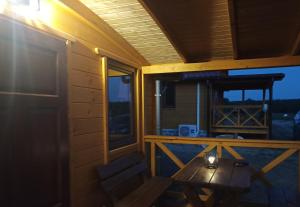 Balkón alebo terasa v ubytovaní Domki z bali u Ireny Mazury