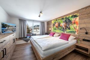 Käserstube Ferienwohnungen客房内的一张或多张床位