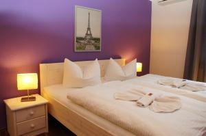 Postel nebo postele na pokoji v ubytování City-Hotel-Wolgast