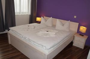 Postel nebo postele na pokoji v ubytování City-Hotel-Wolgast
