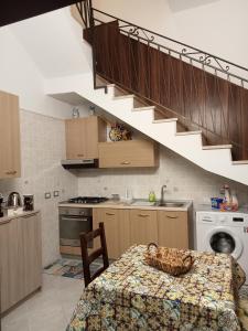 Virtuvė arba virtuvėlė apgyvendinimo įstaigoje Casa Sciacca