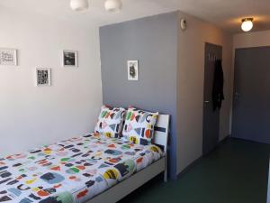 Part-Dieu Lyon Appart tesisinde bir odada yatak veya yataklar