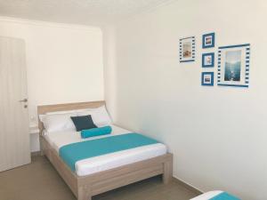 Rúm í herbergi á ORA apartments