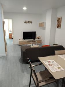 TV a/nebo společenská místnost v ubytování Apartamento Elena