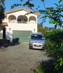 a van parked in front of a house at Heart of Kerikeri - The Studio in Kerikeri