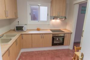 Kuchyňa alebo kuchynka v ubytovaní Apartament Tarracoliva