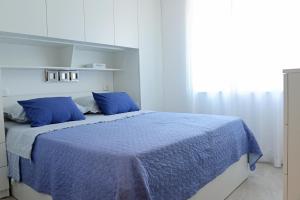 Postel nebo postele na pokoji v ubytování Apartman Milena